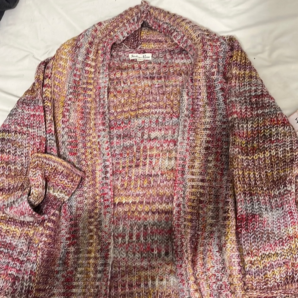 New multi colored oversized sweater. Never worn.